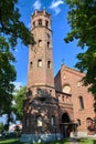 The tower of the historic, Gothic red brick church in the city of Skwierzyna Royalty Free Stock Photo