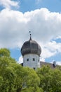 Tower of historic moated castle Schwindegg, blue sky with clouds Royalty Free Stock Photo