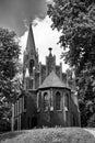 The tower of the historic, neo-Gothic red brick church in the village of Chycina Royalty Free Stock Photo