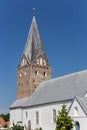 Tower of the historic white church in Mogeltonder