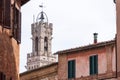 Tower of the iconic Palazzo Pubblico at the Piazza del Campo in downtown Siena