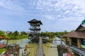 The tower is located in the middle of the water made of wood in Chon Buri Province