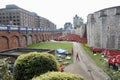 The Tower of London Moat filled with Ceramic Poppies , an art installation named Blood Swept Lands and Seas of Red.