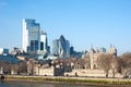 Tower of London overlooked by the Gherkin building and the skyscrapers of the City of London Royalty Free Stock Photo