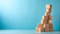 Tower made of cardboard boxes. Blue background. Copy space Royalty Free Stock Photo