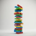 A tower made of colorful rectangular blocks is stacked vertically. The blocks are Royalty Free Stock Photo