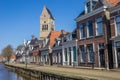 Tower of the martini church along a canal in Bolsward