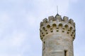 Old German castle tower with arrow slits.