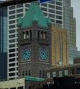 Tower in Minneapolis surrounded by skyscrapers in a bustling city intersection Royalty Free Stock Photo