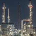 Tower of oil refinery at twilight Royalty Free Stock Photo