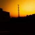 Tower of one provider communication with yellow light in the morning day Royalty Free Stock Photo
