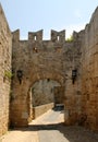 Tower and a part of the fortress wall with a gate, medieval fortress, the old town of Rhodes, Greece