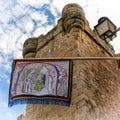 Tower and pennon in Caceres (Spain) Royalty Free Stock Photo