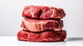 Tower of Raw Beef Steaks: Perfectly Captured on White Background