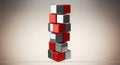 Tower of Red Silver and Grey Cubes Balancing in Equilibrium Concept Royalty Free Stock Photo