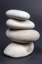 Tower of river stones isolated on black Royalty Free Stock Photo