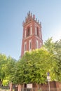 Tower of Roman Catholic church of Adalbert of Prague in Mragowo, Poland