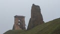 Tower Shchitovka and the church tower. Ruins of Mindovg Castle on Castle Hill. Novogrudok. Belarus. Autumn Royalty Free Stock Photo