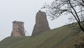 Tower Shchitovka and the church tower. Ruins of Mindovg Castle on Castle Hill. Novogrudok. Belarus. Autumn Royalty Free Stock Photo