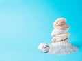 Tower of shells on top of sand, summer concept Royalty Free Stock Photo