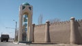 Tower with sign saying XIVA in Uzbekistan