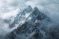 Tower of snow covered peaks majestically reaches for the cloudy heavens Royalty Free Stock Photo