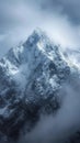 Tower of snow covered peaks majestically reaches for the cloudy heavens Royalty Free Stock Photo
