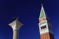 Tower of St. Marks Campanile and the statue of Lion of Venice Royalty Free Stock Photo