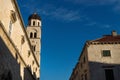 Tower of St. Saviour church on blue sky in Dubrovnik, Croatia Royalty Free Stock Photo