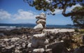 Tower of stones on sea beach background. Relaxing in the tropical beach, with stack of stones. Royalty Free Stock Photo