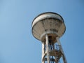 Tower tank water tall architecture storage blue sky background wallpaper copy space structture reservoir steel industry metal Royalty Free Stock Photo