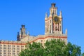 Tower with thermometer of Lomonosov Moscow State University MSU against blue sky Royalty Free Stock Photo