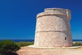 Tower `Torre Son Ganxo`. Punta Prima, Minorca, Spain Royalty Free Stock Photo