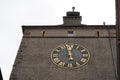 Tower with tower clock showing 5 to 12. Capture in low angle view with symbolic meaning. Royalty Free Stock Photo