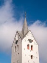 Tower of white Gothic brick church in Thisted, Nordjylland, Denmark