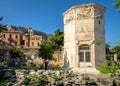 Tower of Winds or Aerides in Roman Agora, Acropolis in distance, Athens, Greece Royalty Free Stock Photo