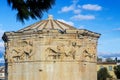 The Tower of the Winds or the Horologion of Andronikos Kyrrhestes octagonal Pentelic marble clocktower in the Roman Agora in Royalty Free Stock Photo