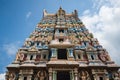 towering gopuram of the temple, rising above the entrance gate