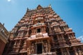 towering gopuram of the temple, rising above the entrance gate