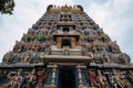 towering gopuram of the temple, rising above the entrance gate