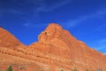 Towering layered red sandstone cliff Royalty Free Stock Photo