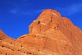 Towering layered red sandstone cliff Royalty Free Stock Photo