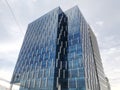 Towering Office Building with Whit Facade