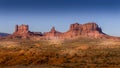 The towering sandstone Mitten Buttes and Mesas of the Navajo Nation`s Monument Valley Royalty Free Stock Photo