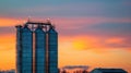 Towering Silo Beside Majestic Skyscraper Royalty Free Stock Photo