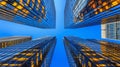 Towering skyscrapers reflecting the serene blue sky in the vibrant business district