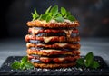 Stacked layers of eggplant parmigiana with tomato sauce and fresh oregano Royalty Free Stock Photo
