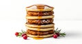 Tall stack of pancakes drizzled with syrup and berries Royalty Free Stock Photo