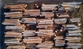 A Towering Stack of Logs on a Rustic Wooden Table Royalty Free Stock Photo