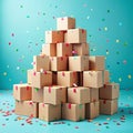 Tower of Cardboard Boxes with Colorful Tape and Falling Confetti on Teal Background package Royalty Free Stock Photo